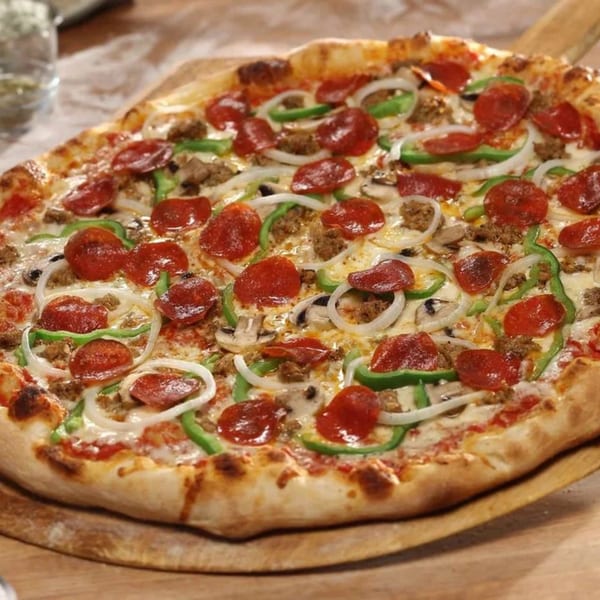 Brooklyn's Pizzeria's supreme pizza with pepperoni, sausage, onions, green peppers, and mushrooms.